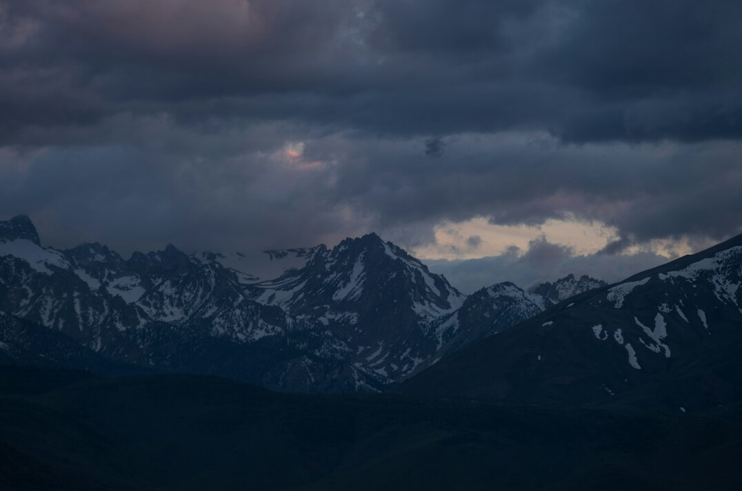 Dramatic mountain range under clouds