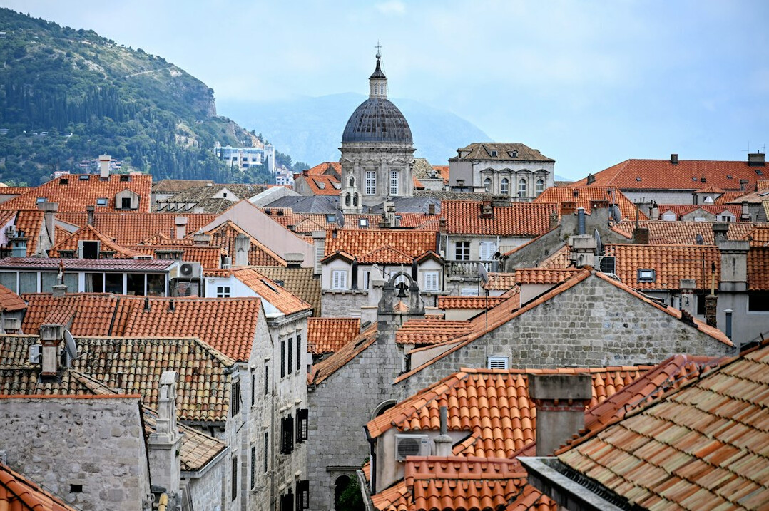 Old town of Dubrovnik with red roofs by the Adriatic sea